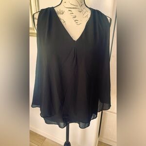 Michel size 2X flowy black top. Runs small fits more like 1X.